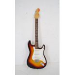 An Encore traditional sunburst Stratocaster electric guitar