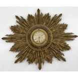 A Smiths sunburst wall clock with roman numeral dial - width