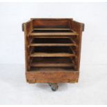 A shelved industrial wooden crate - from Axminster Carpets - length 70cm, depth 79cm, height 90cm