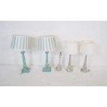 Two pairs of table lamps along with one other