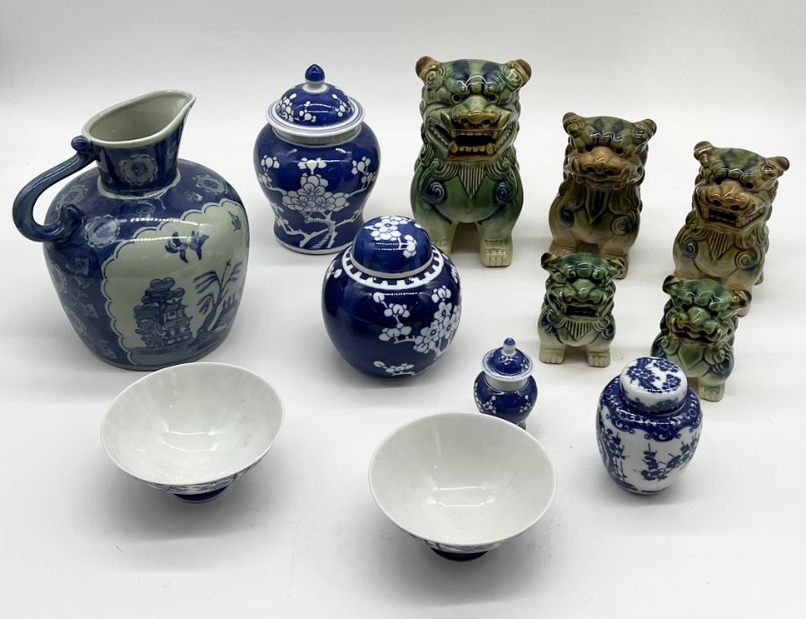 A collection of Chinese and Oriental china including a number of dogs of Fo, ginger jars etc.