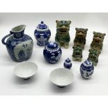 A collection of Chinese and Oriental china including a number of dogs of Fo, ginger jars etc.