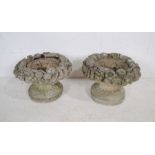 A pair of reconstituted stone garden urns with fruit decoration - diameter 44cm, height 32cm