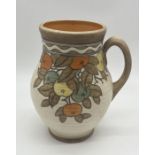 A Charlotte Rhead Crown Ducal jug with fruit motif - Height 26cm