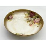 A large Royal Worcester hand painted bowl signed W. Austin decorated with roses and gilt edging -