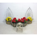 A collection of four garden wirework hanging planters.