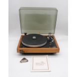 An Ariston Transcription RD80 turntable with instructions