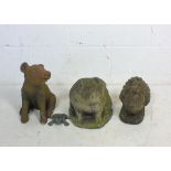 A collection of decorative garden animals including Pigs , Turtles etc