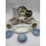 A collection of china including Imari plates, studio pottery vase, relief moulded jug, Wedgwood