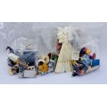 A collection of dolls house accessories including toys, fireside items etc.