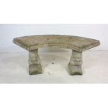 A reconstituted stone bench on squirrel supports