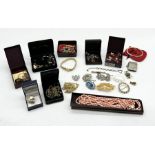 A collection of costume jewellery, silver plated vesta etc.