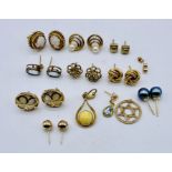 A collection of 9ct gold earrings (some singles), 9ct pendant etc. weight with stones 16.7g