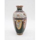 A hexagonal green ground cloisonné vase, finely decorated with exotic animals and foliage etc,