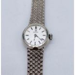 A 9ct white gold ladies Omega watch with 9ct gold strap, total weight 20g