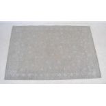 A Louis de Poortere silver 'Casablanca' woven rug - 120cm x 180cm