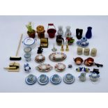 A collection of dolls house accessories including china etc.