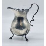 A small hallmarked silver cream jug, weight 80.9g