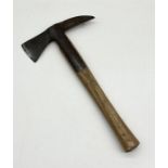 A Brades wooden handled fire axe with broad arrow mark dated 1953 H.98