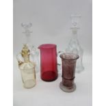 Two antique decanters along with a cranberry jug etc.