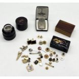 A small Japanese lacquered box along with Ronson lighter, medicine glass in case, various cufflinks,