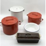 A collection of enamelled lidded pots along with a Le Creuset dish etc.