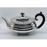 A hallmarked silver teapot, Sheffield 1930, total weight 731.6g