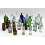 A collection of antique glass bottles including poison bottles, Fennings Fever Curer, Valentine's