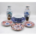 A quantity of Oriental ceramics and metal ware including plates, vases etc.
