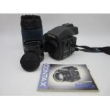 A Contax 645 camera with Carl Zeiss Planar 2/80 lens (serial number 10863008) complete with MFB-1