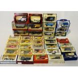 A collection of boxed die-cast vehicles including Matchbox Models of Yesteryear, Lledo Days Gone,