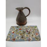 A copper 1 gallon harvest jug along with fabric embroidered with silk cigarette "cards" depicting