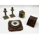 A pair of brass candlesticks, wooden box in the form of a coal scuttle, brass hipflask with image of