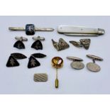 A collection of silver cufflinks, fruit knife, tie pin etc.