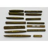 A collection of vintage wooden/brass spirit levels including Smallwood, Marples, E.J.Riley, Rabone &