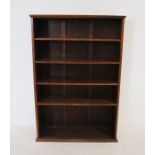 An oak freestanding bookcase - length 104cm, depth 32cm, height 154cm