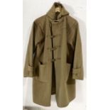 A WW2 era duffel coat in camel with wooden toggles to front and buttons to sleeves