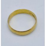 A 22ct gold wedding band, weight 3.3g