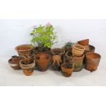 A selection of various sized terracotta pots.