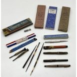 A collection of fountain pens, pencils etc including a Sheaffer 904 pen, two Watermans, sterling