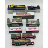 A collection of Eddie Stobart die-cast vehicles including Atlas Editions Scania T Series Curtainside