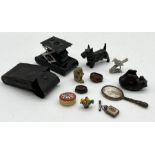 A collection of various items including metal cast Scottish Terrier, bronze matchbox holder in the