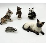 A collection of ceramic animals including Beswick Siamese Cat and USSR tiger, badger and panda etc.
