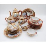 A Japanese egg shell part tea service with character marks