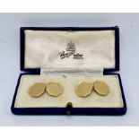 A cased pair of 9ct gold cufflinks, total weight 5.6g
