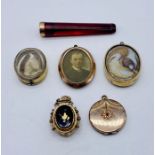 A small collection of antique yellow metal lockets, mourning pendants along with a 9ct gold