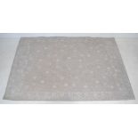 A Louis de Poortere silver 'Casablanca' woven rug - 170cm x 240cm