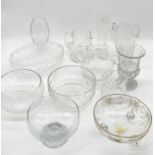 A large collection of cut glass over two shelves including Waterford, Dartington, Galway etc.