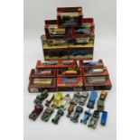 A collection of boxed Matchbox Models of Yesteryear die-cast vehicles, along a collection of loose