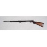 A BSA underlever .22 air rifle, with walnut stock with impressed chequered panels with BSA